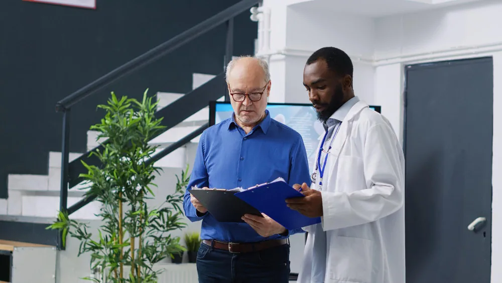 Healthcare professionals reviewing patient health records