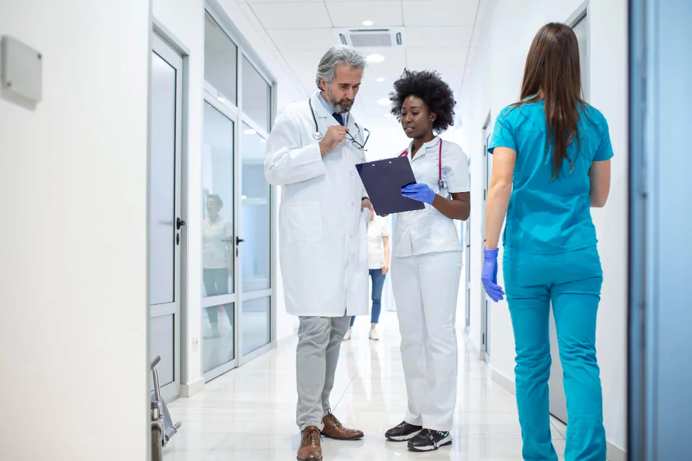 Healthcare team providing support around a patient's medical care