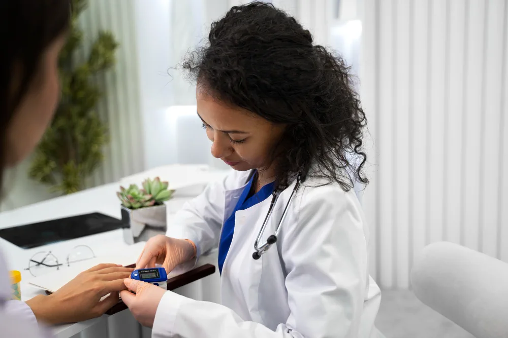 Healthcare provider recording information during a vital sign checkup